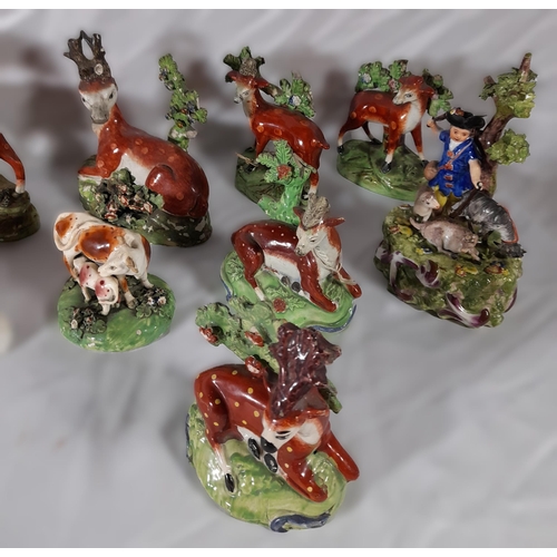 223 - A MIXED GROUP OF EARLY 19TH CENTURY ANIMAL MOUNTED BOCAGE MODELS, mostly Staffordshire, depicting de... 