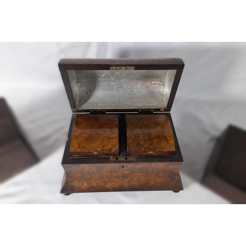 230 - A 19TH  CENTURY WALNUT TEA CADDY,  outswept form with domed cover and compartmented interior, along ... 