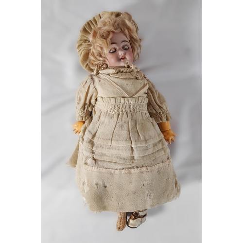 238 - A 19TH CENTURY GERMAN BISQUE HEAD DOLL, along with three biscuit porcelain infant figures, two porce... 