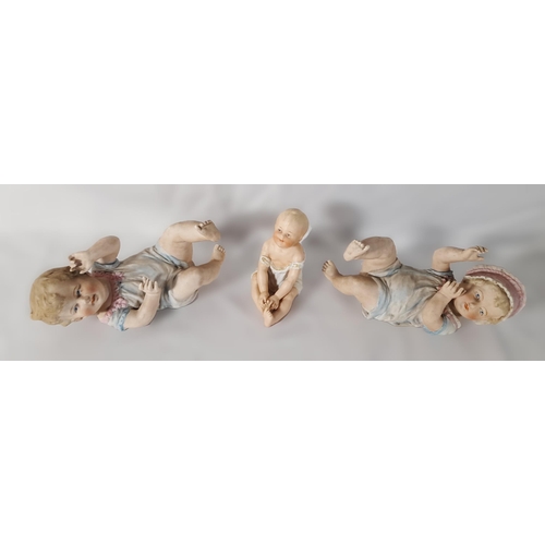 238 - A 19TH CENTURY GERMAN BISQUE HEAD DOLL, along with three biscuit porcelain infant figures, two porce... 