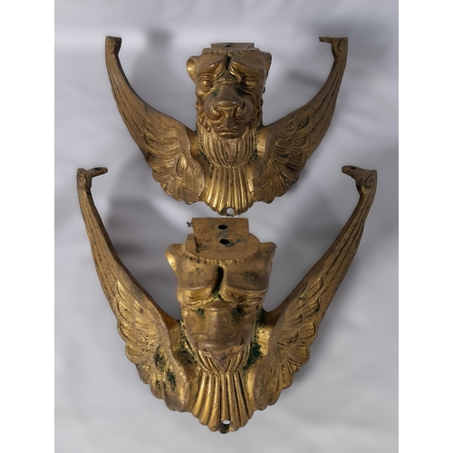 239 - A MIXED GROUP OF VINTAGE METAL WARES, including ornate gilt metal mounts with winged lion masks, a c... 