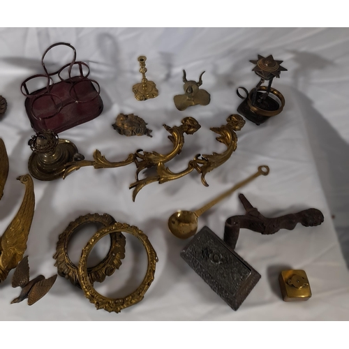 239 - A MIXED GROUP OF VINTAGE METAL WARES, including ornate gilt metal mounts with winged lion masks, a c... 