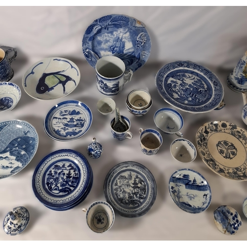 241 - A MIXED GROUP OF CHINESE AND ENGLISH BLUE AND WHITE CHINA WARES, including tea bowls, rice bowls, ta... 