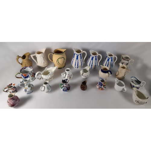 242 - A GRADUATED SET OF VICTORIAN PARIAN WARE JUGS AND A MIXED GROUP OF JUGS AND PITCHERS, including a Du... 