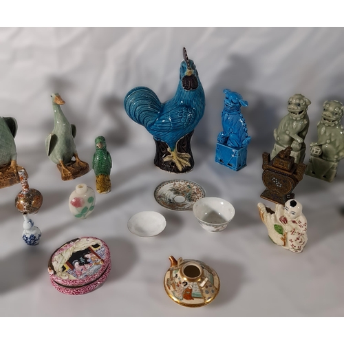 243 - A COLLECTION OF CHINESE AND JAPANESE FIGURES AND TRINKET MODELS, the lot includes a Sancai parrot, t... 