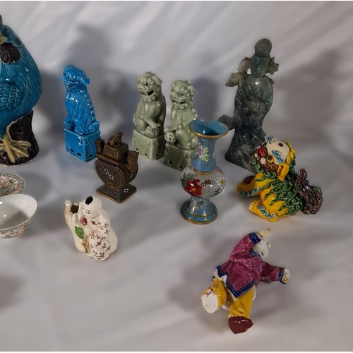 243 - A COLLECTION OF CHINESE AND JAPANESE FIGURES AND TRINKET MODELS, the lot includes a Sancai parrot, t... 