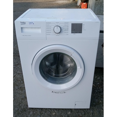 233 - A Beko WTG720MZW 7kg Washing Machine.