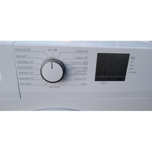 233 - A Beko WTG720MZW 7kg Washing Machine.