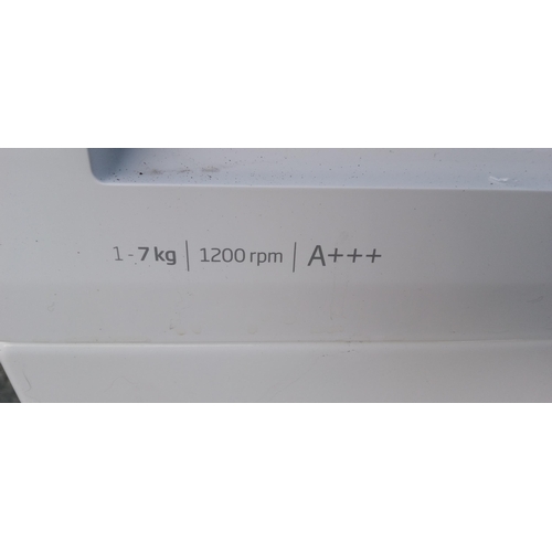 233 - A Beko WTG720MZW 7kg Washing Machine.