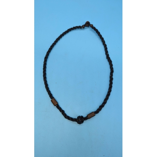 446 - A Vintage Black Bead Necklace