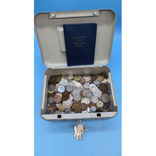 452 - A Cash Tin with Key Containing Worldwide Coins