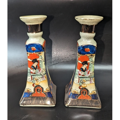 475 - A Pair of Satsuma Geisha Candlesticks.