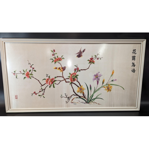 477 - A Chinese Silk Embroidery of Birds and Flowers. 88 x 46cm.