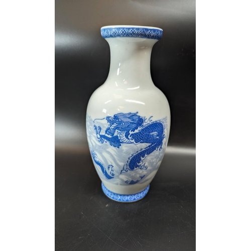 481 - A Blue and White Dragon Vase.