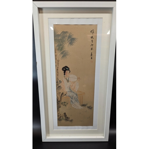 489 - A Chinese Painting of a Lady. 64 x 34cm.