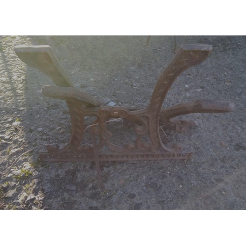 49 - A Pair of Cast Metal Outside Table Ends.