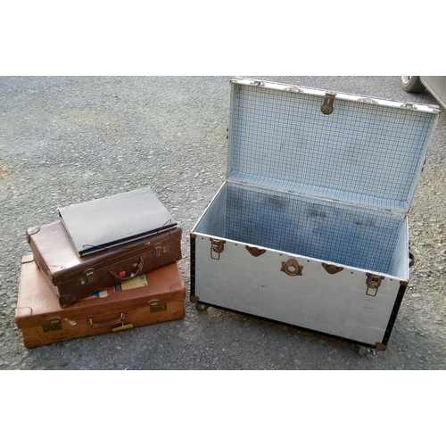 60 - Large Metal Trunk on Wheels with 2 Vintage Suitcases and an Art Folder.