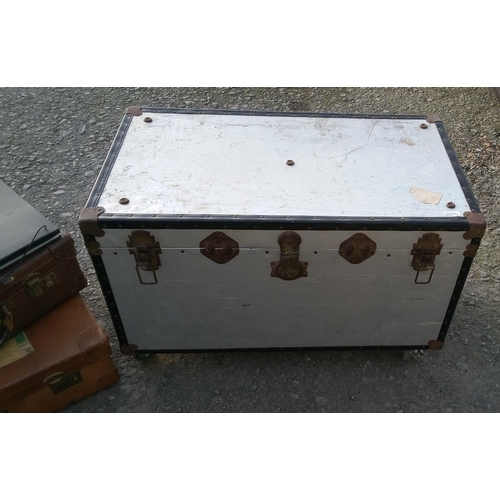 60 - Large Metal Trunk on Wheels with 2 Vintage Suitcases and an Art Folder.