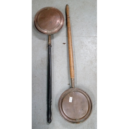 61 - A Pair of Copper Bed Pans.