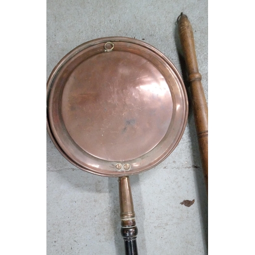 61 - A Pair of Copper Bed Pans.