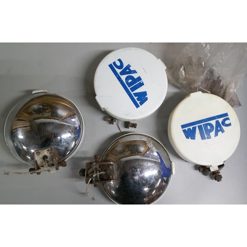 64 - 4 WIPAC Car Spot Lights with covers and fittings.