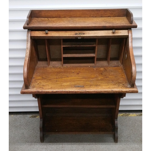 766 - An Antique Tambour Top Writing Desk with Lower Shelves. 104cm H x 75cm W x 50cm D.