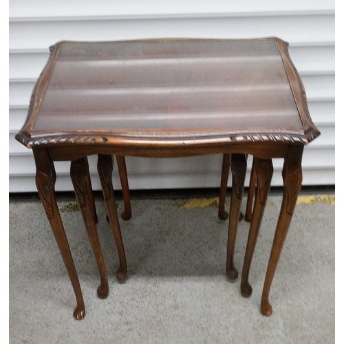 768 - A Vintage Nest of 3 Tables with Carved Details. Top Table has Glass top.