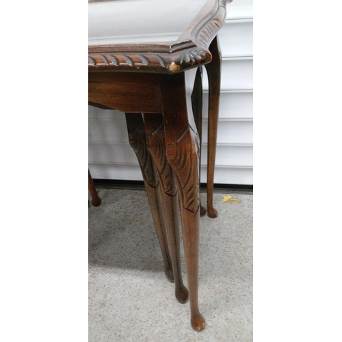 768 - A Vintage Nest of 3 Tables with Carved Details. Top Table has Glass top.