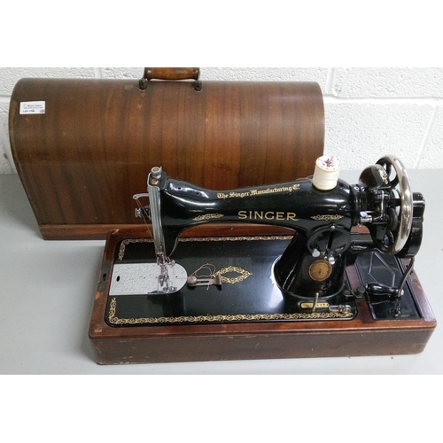 790 - A Singer Sewing Machine in Wooden Case.