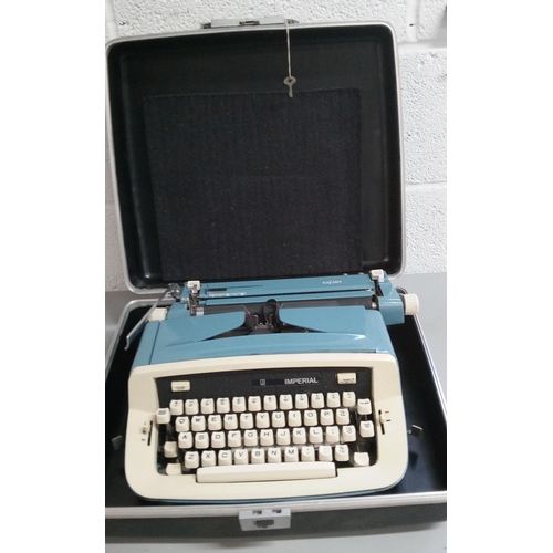 828 - Imperial Safari Typewriter in Hard Case.