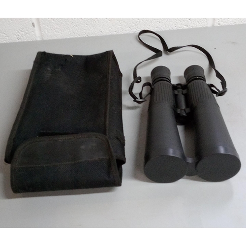 829 - Set of 9 x 63 Binoculars in Canvas Case.