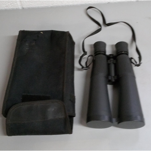 829 - Set of 9 x 63 Binoculars in Canvas Case.