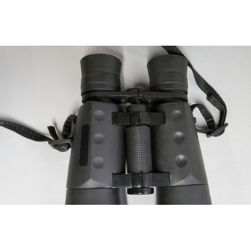 829 - Set of 9 x 63 Binoculars in Canvas Case.