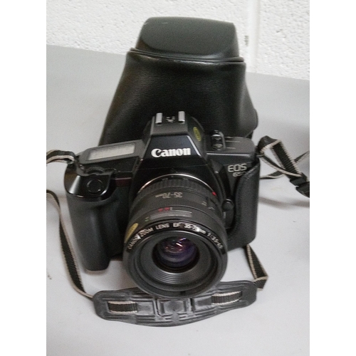 832 - A Canon EOS 650 Camera, Canon AF Zoom Lens 70 -120mm, Sigma AF Super Wide Lens, Canon AF Zoom Lens 3... 