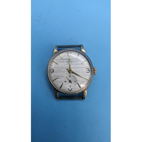 433 - A 9ct Gold Smiths Gentlemans Wristwatch engraved 