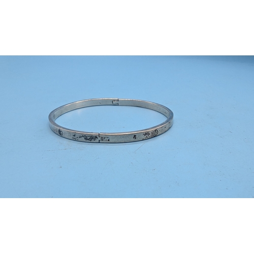 435 - A 925 Silver Marked Hinged Bracelet. 17.2gms.