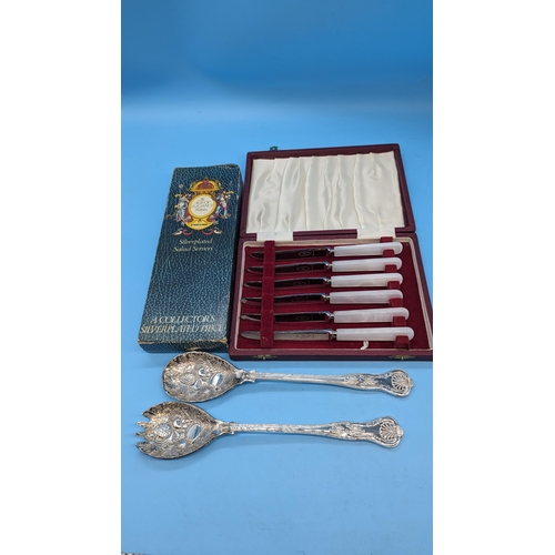 455 - A Cased Set of Knives and Silverplate Salad Servers.