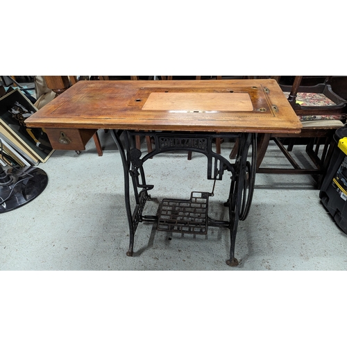 612 - A Gritzner Treadle Sewing Machine Table Base.