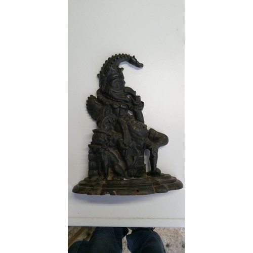 129 - A Cast Iron Mr Punch Door Stop.