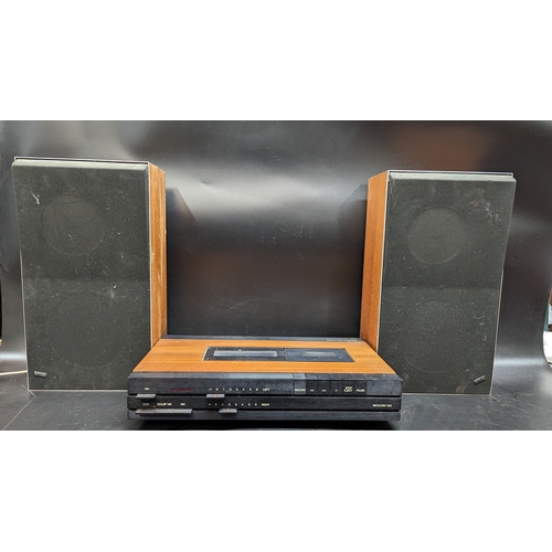 557 - A Bang and Olufsen Beocord 1100 Tape Player and Speakers