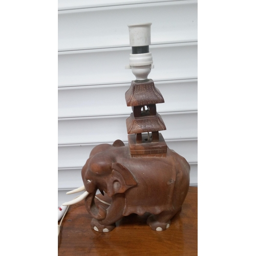 905 - A Carved Elelphant with Pagodo Lamp. 40cm x 30cm.