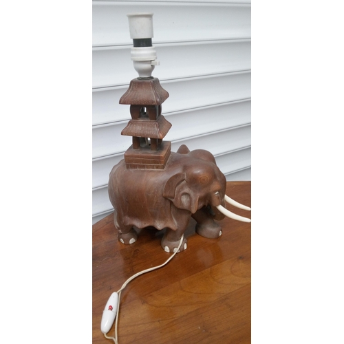 905 - A Carved Elelphant with Pagodo Lamp. 40cm x 30cm.