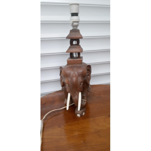 905 - A Carved Elelphant with Pagodo Lamp. 40cm x 30cm.