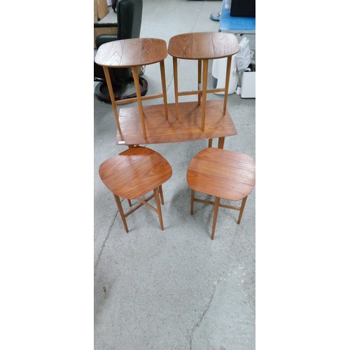 706 - Mid Century Table 4 smaller folding tables that store underneath. Slight damage to top as pictured.