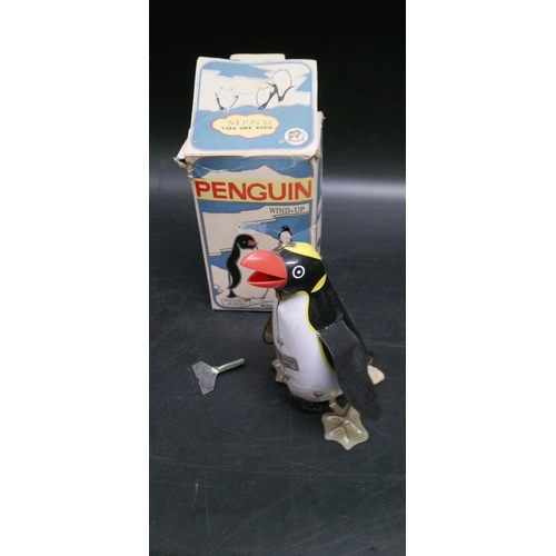 1323 - A Penguin Wind Up Tin Toy.