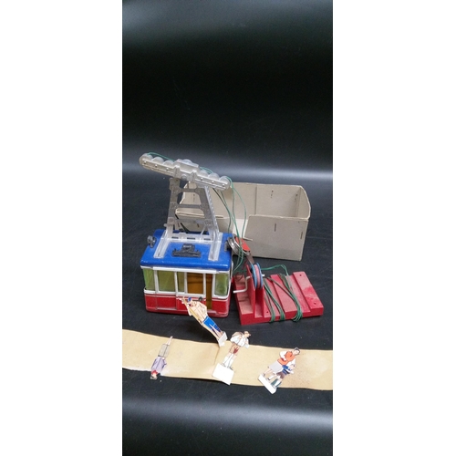 1325 - A Tin Toy Cable Car.