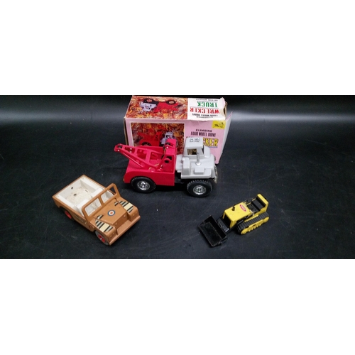 1326 - A Tri-ang Jeep, Tonka Digger and Wrecker Truck.