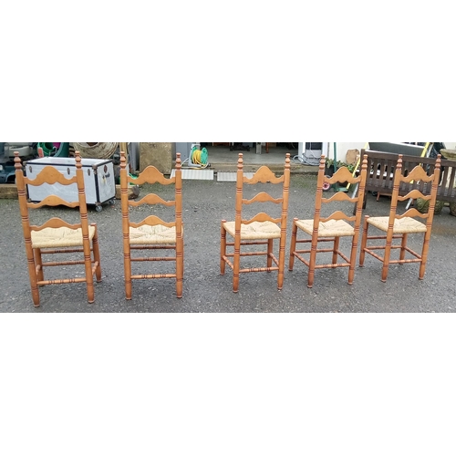 637 - 5 Pine Ladder Back Chairs with Rattan Seating.