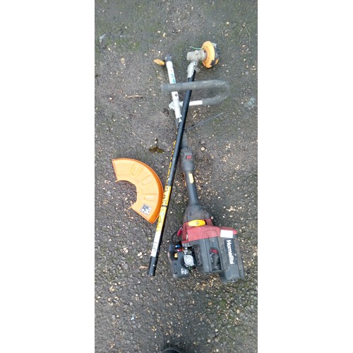 214 - A Homelight Petrol Strimmer with McCulloch Strimmer attachment.