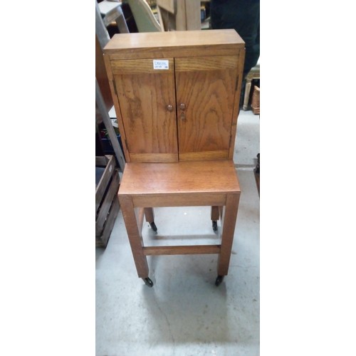 705 - A Mid Century Side Table with Storage Drawers. 89cm H x 36cm W x 34cm D.